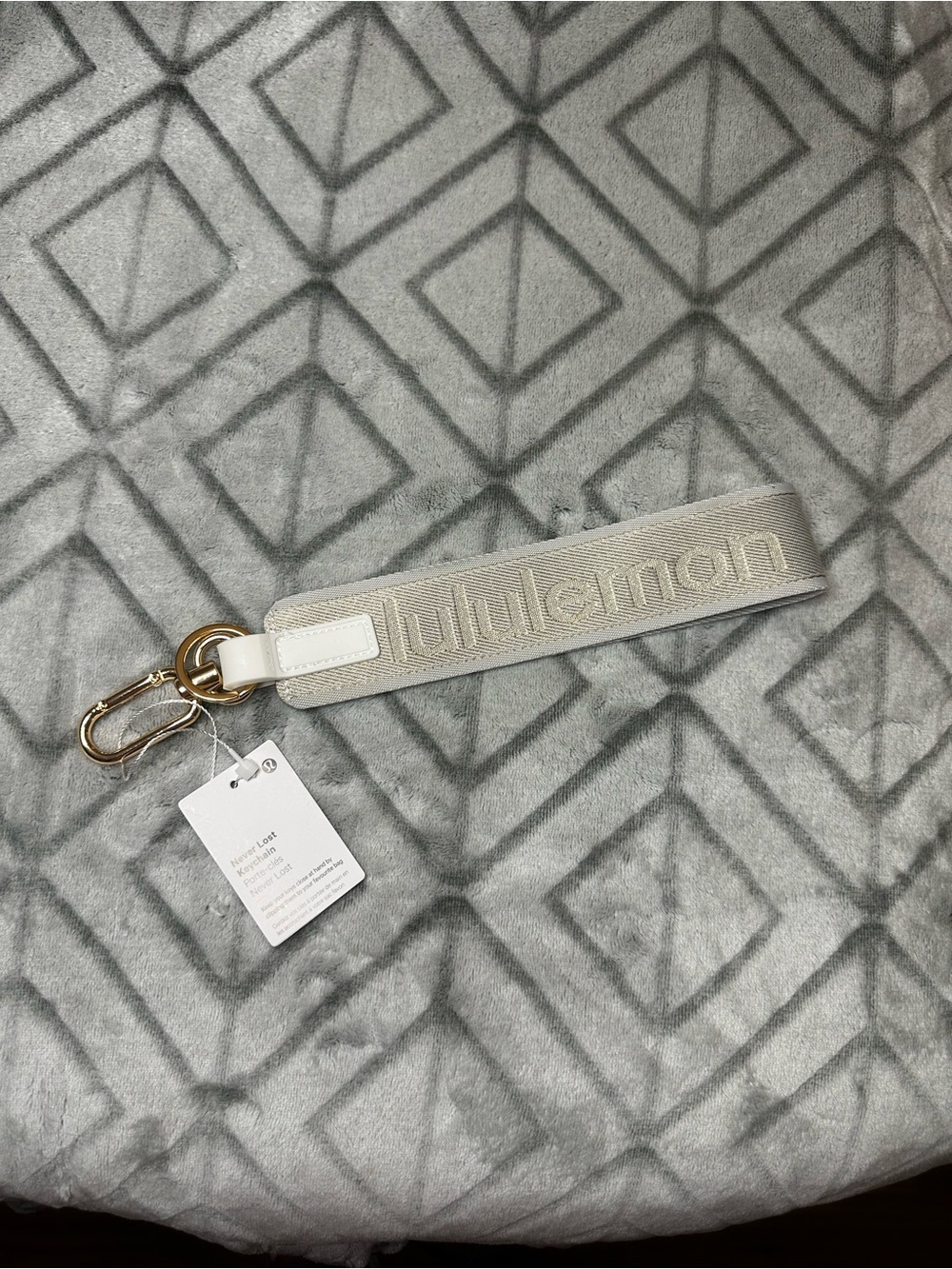 lululemon athletica Silver Never Lost Wristlet Keychain with Gold Hardware